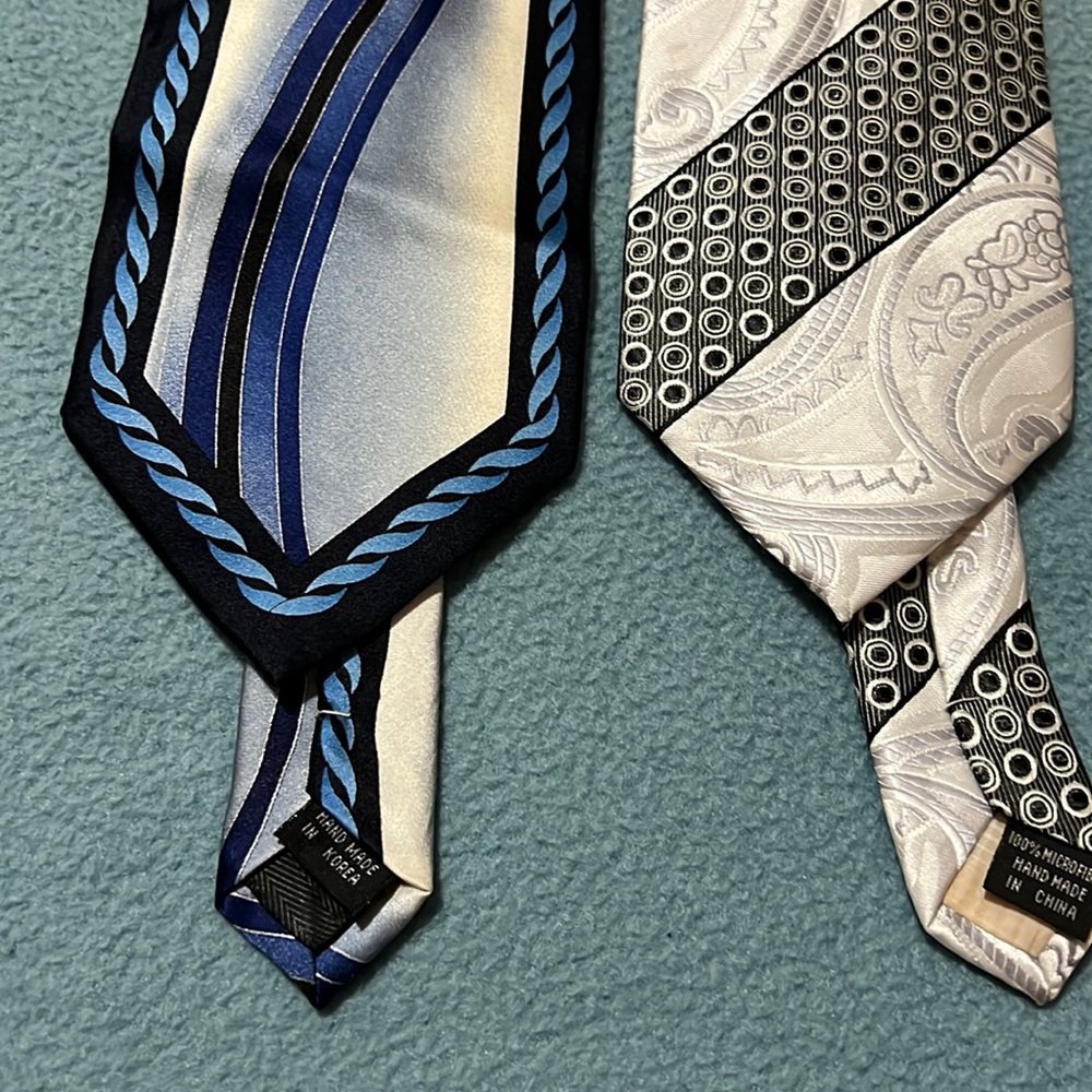 Arrive in style with this pair of mens ties.
